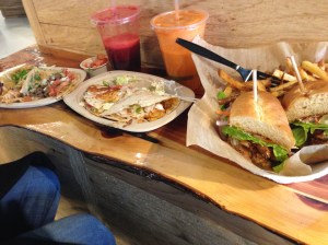 Tacos, juice, and Soft shell crab Po Boy.