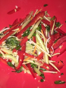 Thai Slaw. Red pepper, ginger, cilantro, basil, broccoli slaw, garlic, and cucumber.